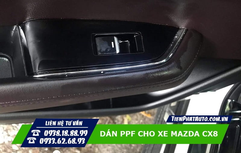 Hình ảnh dán PPF phần nút bấm chỉnh lên xuống kính xe Mazda CX8